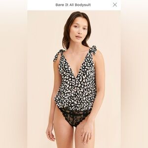 Free People Bare it All Black Animal Print Tie Bodysuit. Message with questions